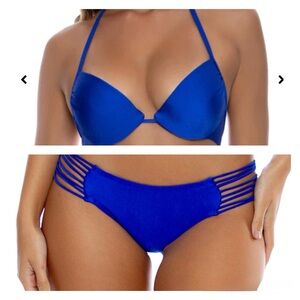 Luli Fama Electric Blue Seamless push up top and Multi String Bottom. Medium